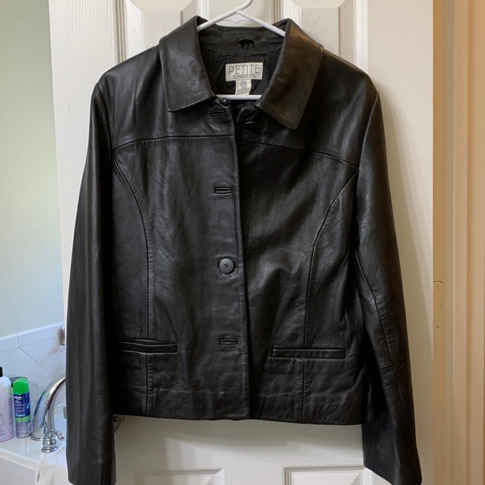 Brown leather “vintage” short jacket.